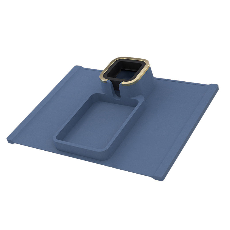 Blue silicone sofa armrest cup holder with irregular shape and gold accent, perfect for holding drinks and small items on couches.