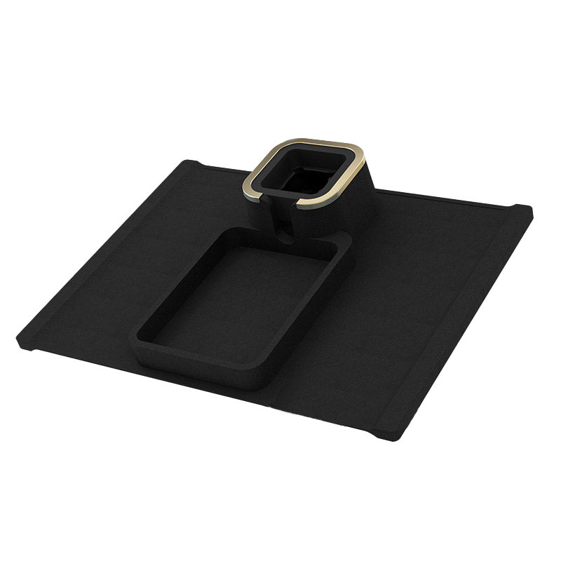 Black silicone sofa armrest cup holder with gold-trimmed cup slot and tray, offering a sleek and functional living room accessory.