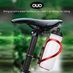 OUO CNC Water Bottle Holder Converter mounted under bike seat holding an extra water bottle for extended cycling trips.